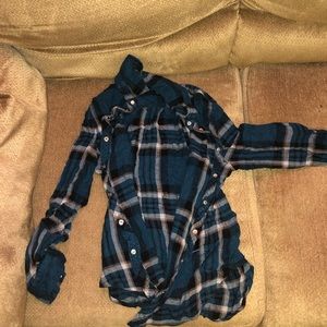 Blue flannel that’s tight around waist